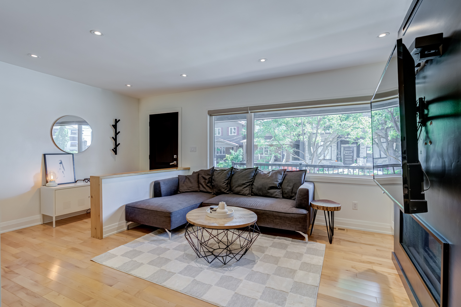 Living room with fireplace feature wall