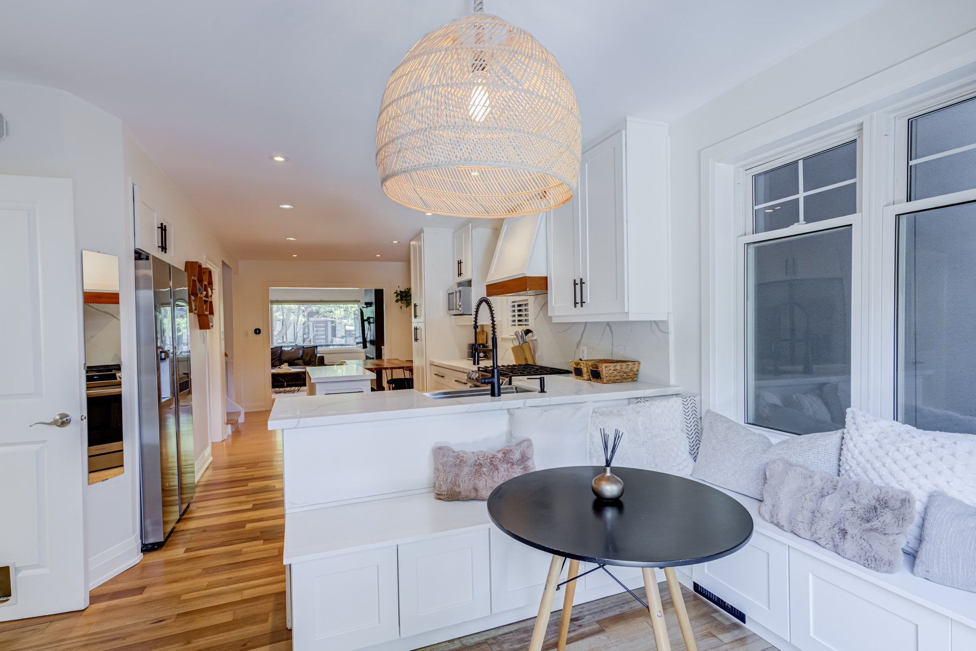 Chef's kitchen with white cabinetry